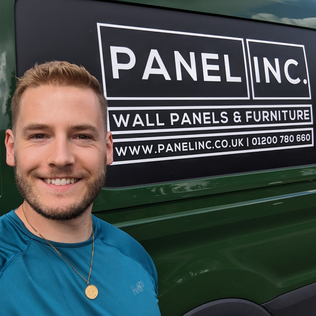 Man standing in front of a green van with 'Panel Inc.' branding.