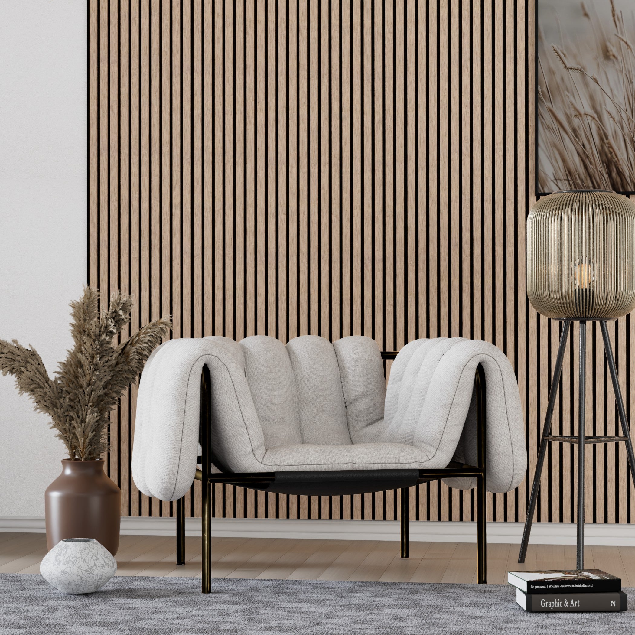 Modern living room with a white sofa, acoustic slat panel wall, and decorative elements.